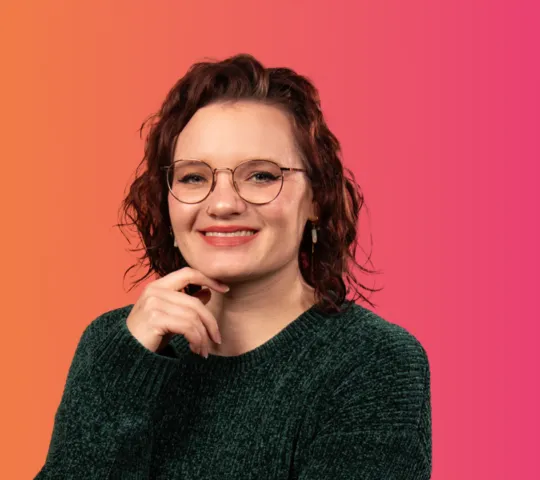 Foto van vrouw die glimlacht.